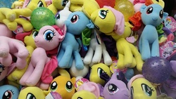 Size: 1600x900 | Tagged: safe, applejack, fluttershy, pinkie pie, rainbow dash, rarity, twilight sparkle, alicorn, pony, g4, crane game, irl, mane six, photo, plushie, toy, twilight sparkle (alicorn)