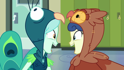Size: 1280x720 | Tagged: safe, screencap, bon bon, lyra heartstrings, sweetie drops, all's fair in love & friendship games, equestria girls, g4, my little pony equestria girls: friendship games, animal costume, background human, bird costume, bon owl, clothes, costume, duo, looking at each other, lyrabird, open mouth, owl costume, peacock costume, smiling