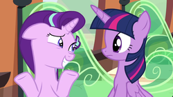 Size: 1906x1074 | Tagged: safe, screencap, starlight glimmer, twilight sparkle, alicorn, pony, unicorn, g4, the crystalling, eye contact, female, floppy ears, frown, grin, looking at each other, mare, nervous, raised eyebrow, shrug, sitting, smiling, squee, train, twilight sparkle (alicorn), wide eyes
