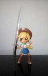 Size: 768x1200 | Tagged: safe, applejack, equestria girls, g4, clothes, doll, equestria girls minis, eqventures of the minis, female, skirt, solo, sword, toy, weapon