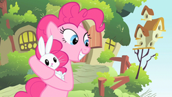 Size: 1280x720 | Tagged: safe, screencap, angel bunny, pinkie pie, baby cakes, g4, coddling, fluttershy's cottage, grin, holding, smiling