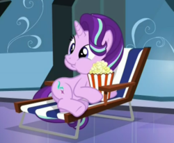 Size: 459x379 | Tagged: safe, screencap, starlight glimmer, pony, unicorn, g4, the crystalling, beach chair, chair, dis gon b gud, eating, food, looking at something, lying down, meta, popcorn