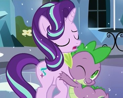 Size: 963x765 | Tagged: safe, screencap, spike, starlight glimmer, dragon, pony, g4, the crystalling, cute, duo, eyes closed, female, hug, male, one eye closed, ship:sparlight, shipping, shipping fuel, straight, wink