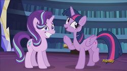 Size: 1280x720 | Tagged: safe, screencap, starlight glimmer, twilight sparkle, alicorn, pony, g4, the crystalling, discovery family logo, female, library, mare, nervous smile, twilight sparkle (alicorn)
