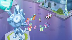 Size: 1280x720 | Tagged: safe, screencap, amber laurel, atticus, cherry valley, citrine nectar, cloudy spinel, coral shores, golden väs, lavender bunch, ruby love, scarlet heart, sly flourish, spike, starlight glimmer, topaz gleam, crystal pony, pony, g4, the crystalling, background pony, colt, crystal heart, female, filly, food, male, mare, popcorn, spike's statue, stallion, statue