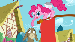 Size: 1280x720 | Tagged: safe, screencap, cranky doodle donkey, pinkie pie, donkey, earth pony, pony, g4, bald, flag, humiliation, megaphone, open mouth, pointing, ponyville, talking, this donkey is really really bald, tongue out