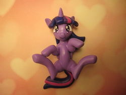 Size: 4320x3240 | Tagged: safe, artist:earthenpony, twilight sparkle, alicorn, pony, g4, female, irl, looking at you, mare, on back, photo, sculpture, smiling, solo, twilight sparkle (alicorn)