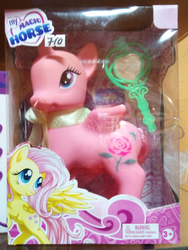 Size: 810x1080 | Tagged: safe, fluttershy, alicorn, pegasus, pony, g4, bootleg, choking hazard, female, irl, mirror, my magic horse, neck bow, photo, price tag, small wings, toy, wings