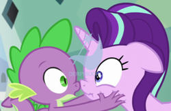 Size: 398x259 | Tagged: safe, edit, edited screencap, screencap, spike, starlight glimmer, derpibooru, g4, derpibooru premium, face grab, meta, watermark