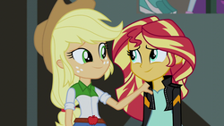 Size: 1280x720 | Tagged: safe, screencap, applejack, sunset shimmer, equestria girls, g4, my little pony equestria girls: friendship games, belt, clothes, comforting, cowboy hat, denim skirt, duo, female, freckles, hat, jacket, leather jacket, looking at each other, shirt, skirt, smiling, stetson