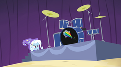 Size: 1280x714 | Tagged: safe, screencap, trixie, equestria girls, g4, my little pony equestria girls: rainbow rocks, drums, female, hiding, musical instrument, solo