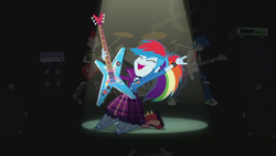 Size: 1280x720 | Tagged: safe, screencap, rainbow dash, thunderbass, equestria girls, friendship through the ages, g4, my little pony equestria girls: rainbow rocks, background human, devil horn (gesture), guitar, punk, rainbow punk, rock (music), rock band