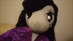 Size: 960x540 | Tagged: safe, artist:bigsexyplush, artist:somethingaboutoctavia, octavia melody, earth pony, anthro, g4, animated, anthro plushie, arm hooves, bedroom eyes, boop, clothes, cute, doll, hand, hooves, irl, pajamas, photo, plushie, silly, surprised, tavibetes, toy