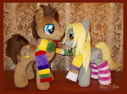 Size: 4120x3056 | Tagged: safe, artist:calusariac, derpy hooves, doctor whooves, time turner, earth pony, pegasus, pony, g4, clothes, cute, female, fourth doctor's scarf, irl, male, mare, photo, plushie, scarf, ship:doctorderpy, shipping, socks, stallion, straight, striped scarf, striped socks