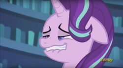 Size: 1413x778 | Tagged: safe, screencap, starlight glimmer, pony, unicorn, g4, the crystalling, blue eyes, book, bookshelf, discovery family, discovery family logo, faic, female, floppy ears, horn, lip bite, mare, nervous, out of context, solo, teeth, twilight's castle, unf, watermark