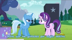 Size: 960x539 | Tagged: safe, screencap, starlight glimmer, trixie, pony, unicorn, g4, no second prances, dat face, discovery family logo, duo, faic, female, lidded eyes, mare, out of context, shipping fuel, spanish, translated in the description
