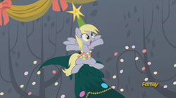 Size: 1478x826 | Tagged: safe, screencap, derpy hooves, pegasus, pony, a hearth's warming tail, g4, christmas lights, christmas tree, derpy star, discovery family logo, female, hat, mare, sitting in a tree, solo, stars, tree