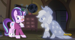 Size: 546x292 | Tagged: safe, screencap, applejack, snowfall frost, spirit of hearth's warming past, starlight glimmer, pony, unicorn, a hearth's warming tail, g4, clothes, discovery family logo, duo, frock coat, jabot, pince-nez, shirt, spats, spirit