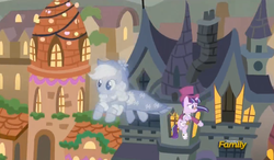 Size: 837x490 | Tagged: safe, screencap, applejack, snowfall frost, spirit of hearth's warming past, starlight glimmer, pony, unicorn, a hearth's warming tail, g4, discovery family logo, duo, female, flying, frown, hat, lasso, mare, pince-nez, rope, smiling, snowfall frost's house, spirit, top hat