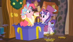 Size: 837x490 | Tagged: safe, screencap, pinkie pie, snowfall frost, spirit of hearth's warming presents, starlight glimmer, a hearth's warming tail, g4, discovery family logo, hooves up, present