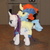 Size: 1594x1594 | Tagged: safe, artist:cheerbearsfan, rarity, keldeo, pony, g4, interspecies, irl, keldity, out of context, photo, plushie, pokémon, pokémon riding ponies, pony on pokémon action, riding