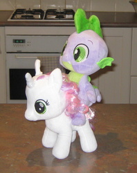Size: 1189x1505 | Tagged: safe, artist:cheerbearsfan, spike, sweetie belle, dragon, pony, g4, dragons riding ponies, female, irl, male, photo, plushie, riding, ship:spikebelle, shipping, spike riding sweetiee belle, straight