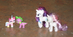 Size: 2605x1326 | Tagged: safe, artist:cheerbearsfan, rarity, spike, sweetie belle, g4, blind bag, brushable, crossover, crossover shipping, irl, lego, photo, shipping, the lego movie, toy, unikitty, unispike