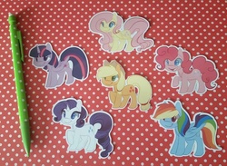 Size: 960x702 | Tagged: safe, artist:ellesdoodlebox, applejack, fluttershy, pinkie pie, rainbow dash, rarity, twilight sparkle, alicorn, pony, g4, female, irl, mane six, mare, photo, sticker, twilight sparkle (alicorn)