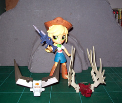 Size: 1121x950 | Tagged: safe, applejack, equestria girls, g4, clothes, dead, deantler, decapitated, dispelow, doll, equestria girls minis, female, gat-22 30mm heavy machine gun, hunter, hunting, hunting trophy, implied murder, irl, photo, severed head, skirt, toy, zoids, zoids blox