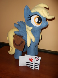 Size: 2448x3264 | Tagged: safe, artist:calusariac, derpy hooves, pegasus, pony, g4, female, irl, letter, mail, mare, photo, plushie, saddle bag, toy