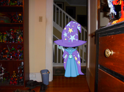 Size: 639x477 | Tagged: safe, artist:eli-j-brony, artist:outlawquadrant, trixie, pony, unicorn, g4, action figure, cape, clothes, door, dresser, female, irl, looking at you, mare, photo, ponies in real life, room, shoes, stairs, toy, trash can, trixie's glare, trixie's hat, vector