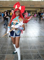 Size: 1879x2507 | Tagged: safe, apple bloom, human, apple bloomers, bronycon 2016, g4, bandeau, clothes, cosplay, costume, irl, irl human, magic staff, midriff, photo, staff