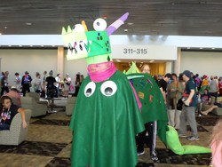 Size: 2579x1935 | Tagged: safe, crackle, twilight sparkle, dragon, human, bronycon 2016, dragon quest, g4, clothes, cosplay, costume, crackle costume, dragon disguise, irl, irl human, photo, two-person costume