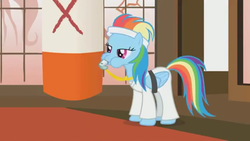 Size: 960x540 | Tagged: safe, screencap, rainbow dash, pony, call of the cutie, g4, black belt, blowing, clothes, coach, coach rainbow dash, dojo, gi, headband, karate, lidded eyes, martial arts, pants, ponyville dojo, puffy cheeks, rainblow dash, rainbow dashs coaching whistle, robe, training, training montage, whistle, whistle necklace