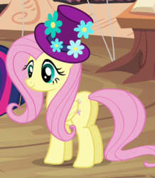 Size: 419x480 | Tagged: safe, screencap, fluttershy, pony, daring don't, g4, butt, cropped, female, flower, flower in hat, hat, mare, national random holiday party day, plot