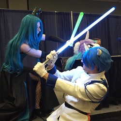 Size: 1882x1882 | Tagged: safe, artist:ladyava, artist:wanderingwolf83, photographer:rj_para, queen chrysalis, shining armor, human, bronycon, g4, clothes, cosplay, costume, irl, irl human, lightsaber, photo, star wars, sword fight, weapon