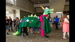 Size: 1300x731 | Tagged: safe, crackle, dragon, human, bronycon, bronycon 2016, dragon quest, g4, clothes, convention, cosplay, costume, crackle costume, crackle's cousin, dragon costume, irl, irl human, photo, two-person costume