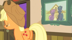 Size: 1100x618 | Tagged: safe, screencap, applejack, earth pony, pony, apple family reunion, g4, american gothic, butt, eyes closed, female, freckles, mare, painting, pitchfork, plot, smiling, solo