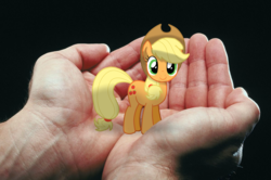 Size: 1200x796 | Tagged: safe, artist:barbra, applejack, g4, appletini, cute, in goliath's palm, irl, jackabetes, micro, photo, ponies in real life, tiny ponies, vector