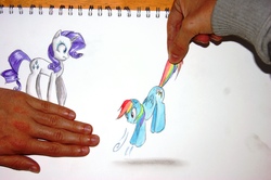 Size: 4592x3056 | Tagged: safe, artist:my-magic-dream, rainbow dash, rarity, human, g4, clever, hand, irl, micro, photo, ponies in real life, tail, tail pull, tiny ponies