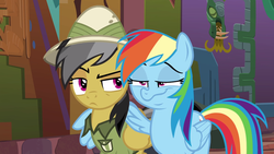 Size: 1904x1076 | Tagged: safe, screencap, daring do, rainbow dash, pony, g4, stranger than fan fiction, dash face, faic, hug, rainbow dash is best facemaker, smug, smugdash, unamused, winghug