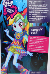 Size: 738x1077 | Tagged: safe, rainbow dash, equestria girls, g4, my little pony equestria girls: legend of everfree, box art, camp fashion show outfit, clothes, doll, equestria girls logo, female, french, german, outfit, promotional art, solo, spanish, toy