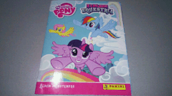 Size: 632x354 | Tagged: safe, fluttershy, rainbow dash, twilight sparkle, alicorn, pony, g4, explore equestria, gif, non-animated gif, panini, spanish, sticker album, twilight sparkle (alicorn)