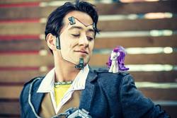 Size: 2048x1366 | Tagged: safe, artist:vincitorecosplay, rarity, human, borderlands, borderlands 2, brushable, butt stallion, clothes, cosplay, costume, handsome jack, irl, irl human, photo, toy