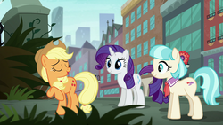 Size: 1920x1080 | Tagged: safe, screencap, applejack, coco pommel, rarity, earth pony, pony, unicorn, g4, made in manehattan, 1080p, applejack's hat, bronclyn, coco's apartment building, cowboy hat, eyes closed, female, grass, hat, manehattan, mare, overgrown, park, raised hoof, skyscraper