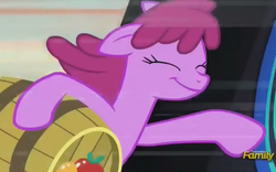 Size: 1112x692 | Tagged: safe, screencap, berry punch, berryshine, earth pony, pony, g4, slice of life (episode), barrel, discovery family logo, female, happy, mare, solo