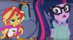 Size: 1422x780 | Tagged: safe, screencap, sci-twi, sunset shimmer, twilight sparkle, equestria girls, g4, my little pony equestria girls: legend of everfree, blushing, out of context, ponytail, raised eyebrow
