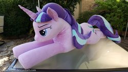 Size: 1024x576 | Tagged: safe, artist:neysanight, starlight glimmer, g4, female, irl, life size, photo, plushie, prone, solo