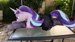 Size: 1024x576 | Tagged: safe, artist:neysanight, starlight glimmer, g4, clothes, female, irl, life size, photo, plushie, prone, solo, stockings