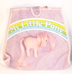 Size: 596x613 | Tagged: safe, photographer:kisscurl, photographer:spinky69er, cotton candy (g1), earth pony, pony, g1, bag, female, irl, mare, merchandise, photo, purse, solo, toy